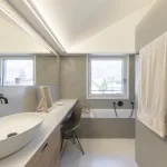 What are the alternatives to tiles in the bathroom?
